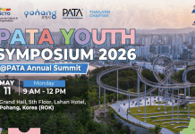 Youth gather under the PATA flag